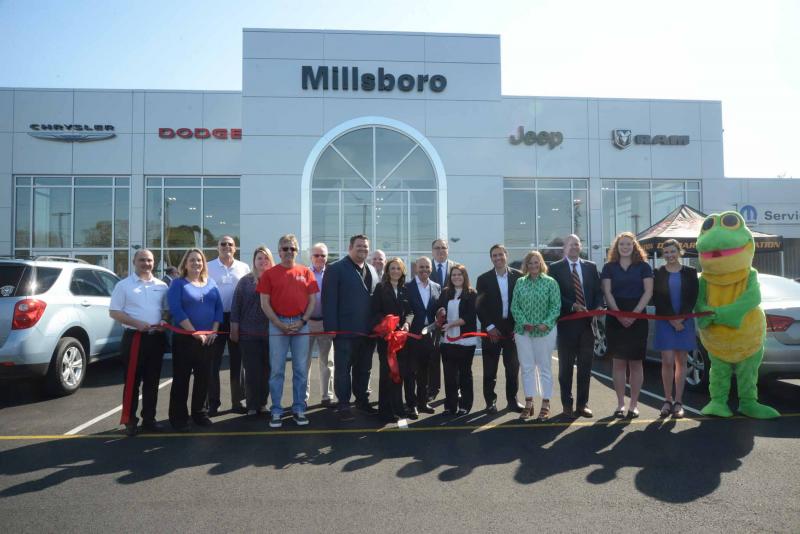 Shown at the ribbon-cutting in back are (l-r) Joe Busby, JB Construction; Kelli Mills, JB Construction; John Thorougood, Millsboro mayor; Sheldon Hudson, Millsboro town manager; Bob Collins, Fulton Bank; and Bill Snyder, COO Preston Auto Group. In front are J.B. Burnett, general manager; Wendy Melvin, Preston Auto Group; David Wilson Jr., Preston Auto Group; Peggy Wilson, Preston Auto Group; David Wilson Sr., Preston Auto Group; Brittany Holland, Preston Auto Group; Kim Snyder, Preston Auto Group; Chris Marks, Preston Auto Group; Sarah Coleman, Chrysler; and Ella Wendy, Chrysler. Millsboro CDJR