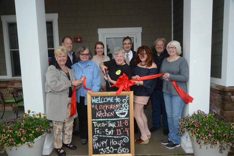 Shown at the ribbon-cutting in back are (l-r) Kevin Loftus, La Red; Tiffany Walters, County Bank; Charlie Koskey, Chardon Jewelers; and Tom Jones, Irish Eyes. In front are Vicki Sammons, Milton Chamber vice president; Marie Mayor, Lavender Fields; Deidre Smith, owner; Kathy McGinty, Cape Gazette; and Terri Fox, Milton Chamber of Commerce executive director. A Different Kitchen