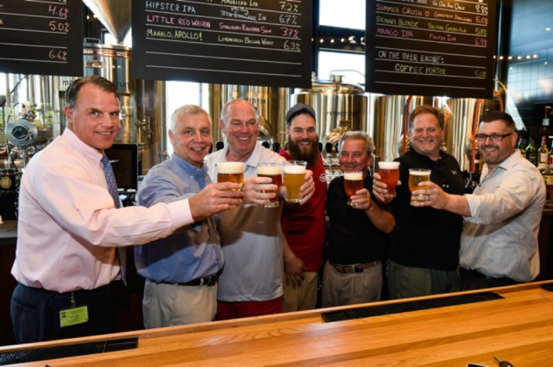 Toasting the opening of Iron Hill Brewery in Rehoboth Beach are (l-r) Cape Henlopen School District Superintendent Robert Fulton; Iron Hill co-founder Kevin Finn; Speaker of the House Rep. Peter Schwartzkopf, D-Rehoboth; Iron Hill Brewery Rehoboth Beach Head Brewer John Panasiewicz; Iron Hill co-founder Kevin Davies; Iron Hill co-founder Mark Edelson; and Iron Hill Brewery Rehoboth General Manager Rick Whittick. SUBMITTED PHOTO