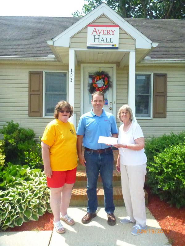 Avery Hall Insurance Group donates to Milton food pantry Cape Gazette