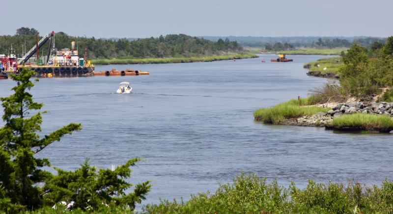 This photo, taken from the east side of Roosevelt Inlet, shows the mouth of the Broadkill River minus the derelict wharf that sat - up until last spring - almost in the center of the river off that point of land on the near end of Beach Plum Island. If you look at this column on capegazette.com, you will see a Ron MacArthur photo from a few years back showing this same scene at sunset with the old wharf still in place. DENNIS FORNEY PHOTO