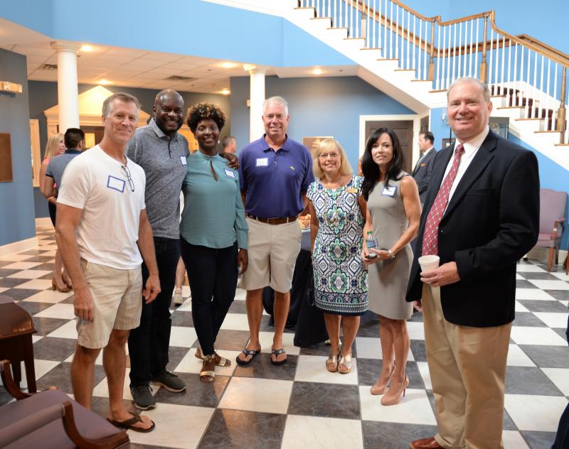 Pausing for a photo at the New Parent Coffee are (l-r) David Crossett, Berlin, Md.; Anthony Betterson, Berlin; Cynthia Betterson, Berlin; Douglas Hess, Selbyville; WPS School Counselor Kathy Roberts, Berlin; Jennifer Crossett, Berlin; and WPS Head of School Randal Brown, Salisbury, Md.