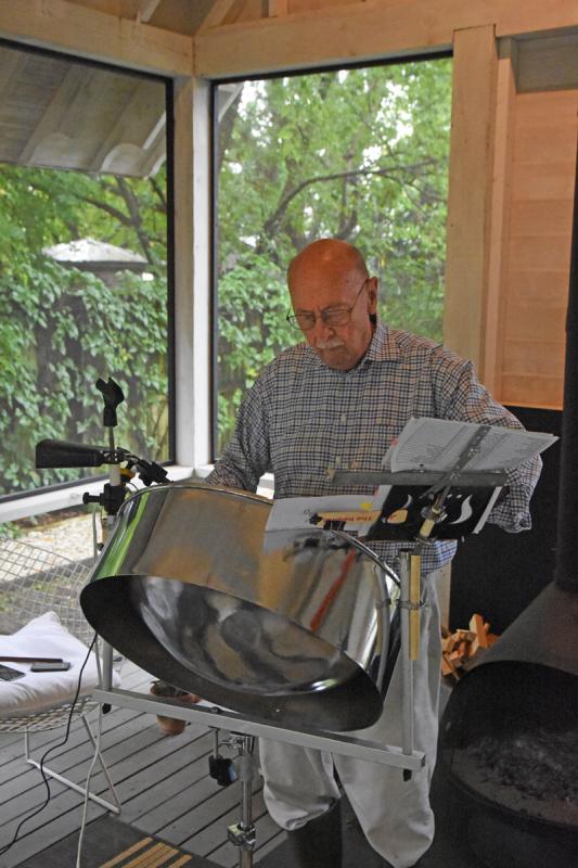 David Downing plays the steel drums to lift everyone’s spirits.