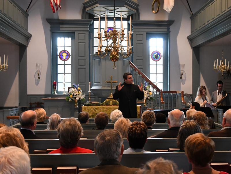 Jackson Borges directs a hymn during The People’s Jazz Mass at St. George’s Chapel Sunday, Oct. 14. DAN COOK PHOTO