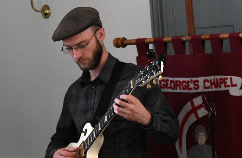 Andrea Wood Jazz Quartet guitarist Nick Wood plays a Jazz Hymn during The People’s Jazz Mass at St. George’s Chapel Sunday, Oct. 14. DAN COOK PHOTO