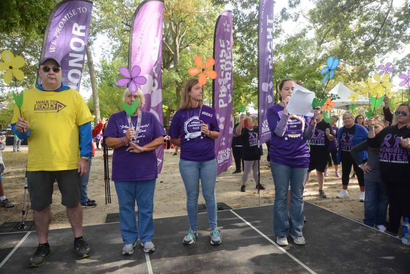 On stage telling their stories are (l-r) Al Manzoni, who is helping his wife care for her father; Linda Synden, who lost her husband; Aimee Isaac, an advocate for Alzheimer's as a result of her father's diagnosis; and Katie Macklin, executive director for the Alzheimer's Association Delaware Valley Chapter. Walk to End Alzheimers