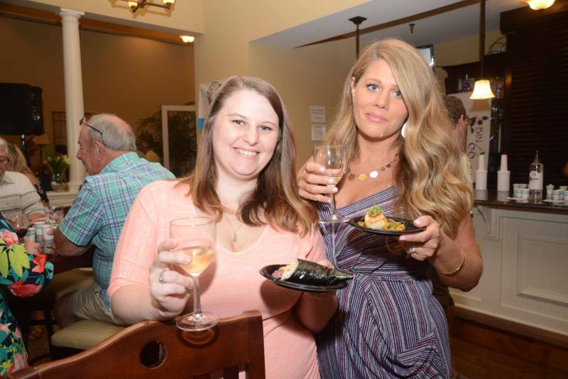 Ready to enjoy a pairing of Cultured Pearl Maki Sushi and Hess Panthera Chardonnay are Raven Harris, left, and Nicole Scott. SoDel Wine and food
