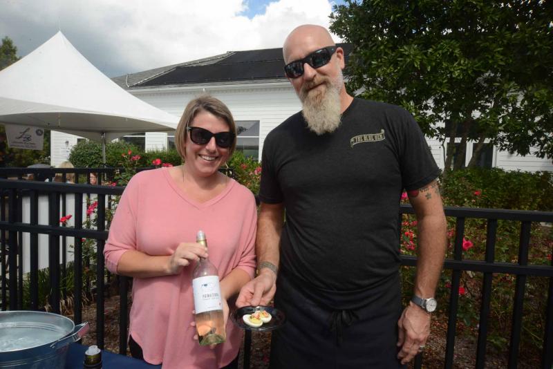Jessica Janssen from Bacchus Imports and Chris Bisaha from Blue Hen show their paring of Primatera Pinot Grigio and lobster curried deviled eggs. SoDel Wine and food