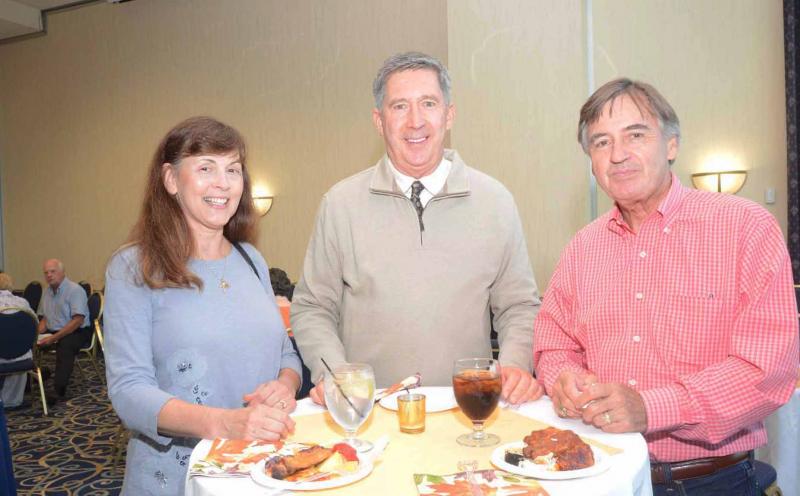 Enjoying the fine hors d'oeuvres are (l-r) Lynn Brittingham, Bob Harrison and Ken Brittingham. All Saints’ Celebration 2018