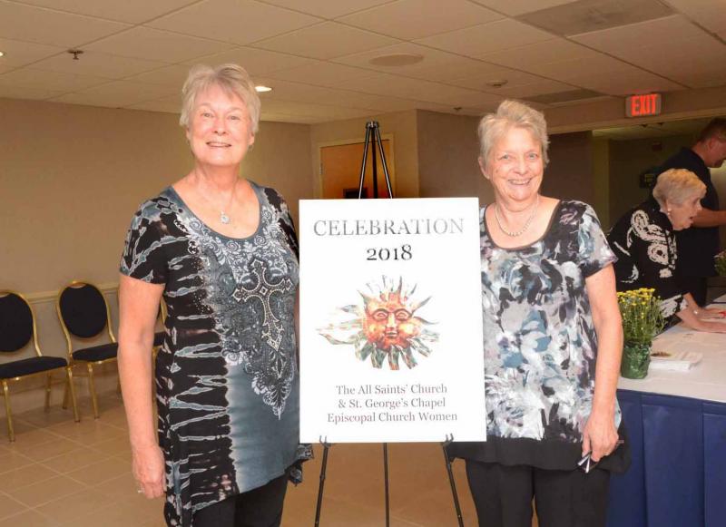Celebration 2018 co-chairs Dorsey Johnson, left, and Gerri Stephenson pause during their busy evening for a photo next to the Celebration 2018 sign. This is the biggest fundraiser of the year for the Episcopal Church Women of All Saints’ Church and St. George’s Chapel. All Saints’ Celebration 2018
