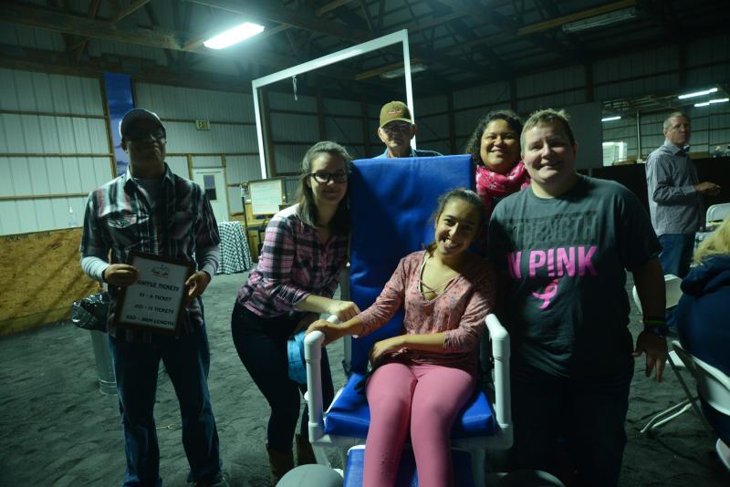 The Riders gather for a photo during the selling of raffle tickets. Shown are (l-r) Sasah Hudson, Haley Bonritchie, volunteer Donnell Bailey, Annmarie Pirotta, volunteer Donna Walton and Jimmy Messick. SDTR Barn Dance