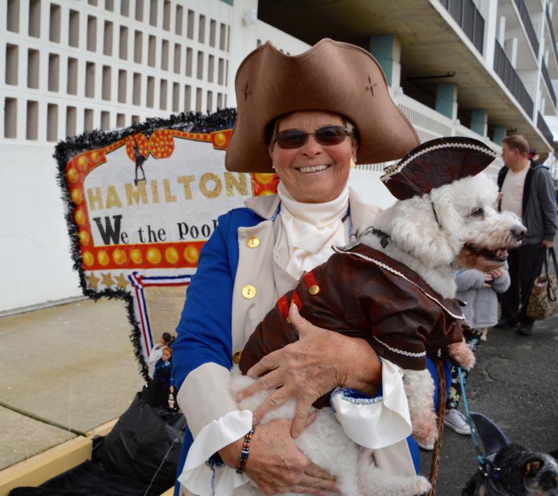 Sharon Miken and Tully Moore, a bichon-poodle mix, of Lewes, capitalize on the historical character Alexander Hamilton. RON MACARTHUR PHOTO