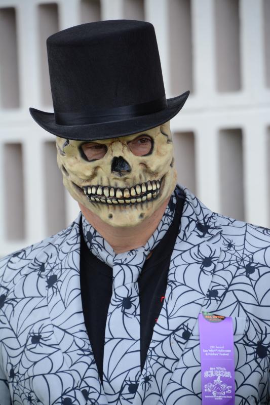 A member of the pet parade monster patrol keeps a spooky eye on the proceedings. RON MACARTHUR PHOTO