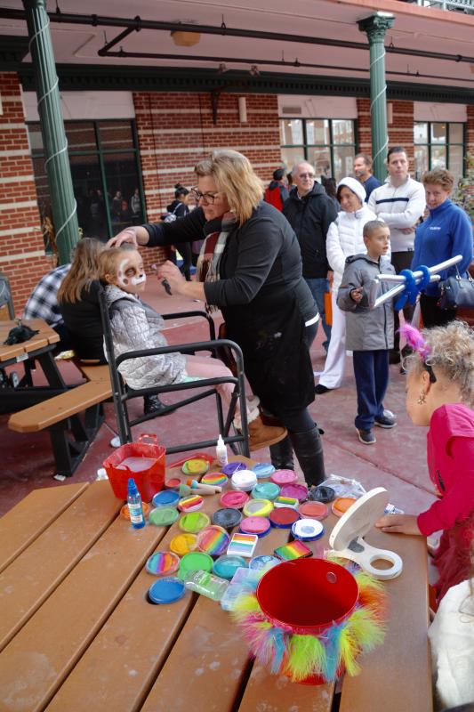 Lines are long all day for face painting at the Schell Brothers’ Kid’s Zone at First Street Station. RON MACARTHUR PHOTO