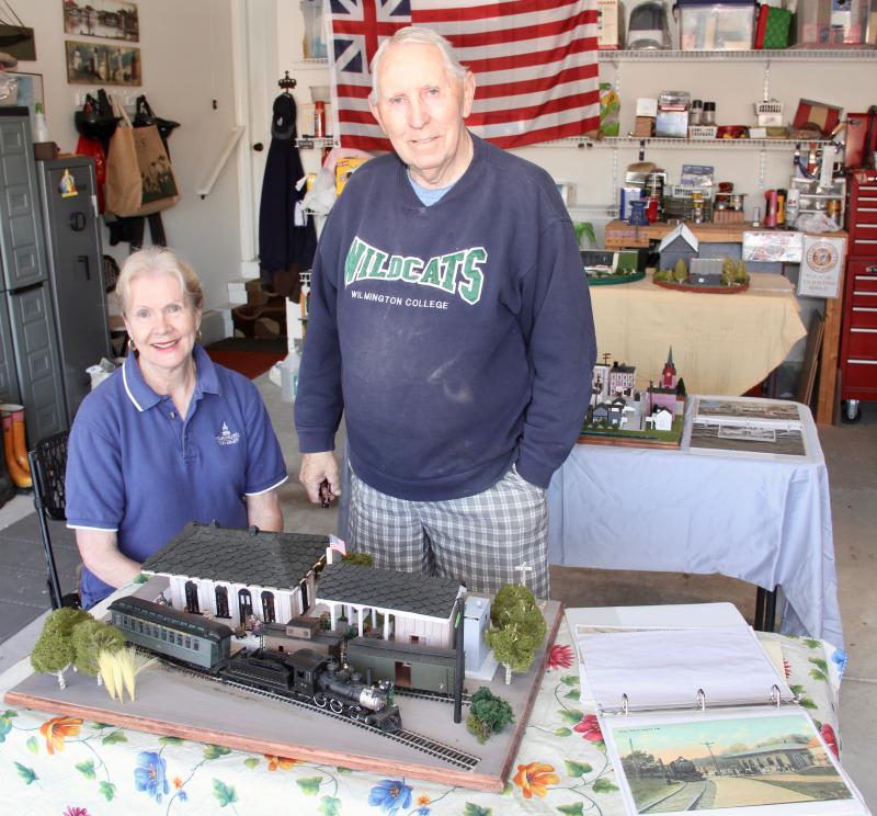 Natalie Ingram and Dick Sharp worked together on his model of the old Lewes train station located along Kings Highway where the Lewes History Museum in the Margaret H. Rollins Community Center now stands. In the foreground is one of the photographs that a neighbor used to extract precise dimensions for the re-creation.