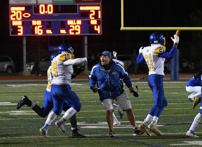 Sussex Central head coach John Wells celebrates the Knights’ 21-20 win over Dover. They will make their first appearance in the DIAA final since 2008 and their fourth overall. DAN COOK PHOTOS