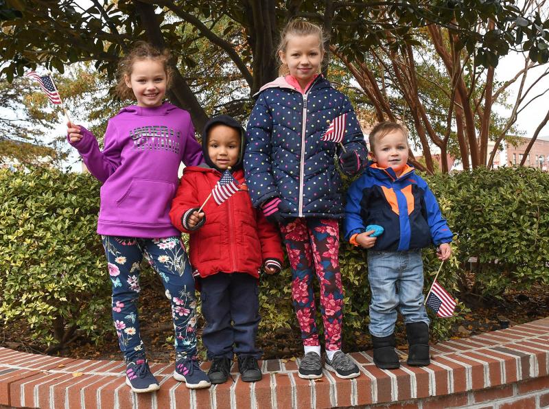 Showing patriotic spirit (l-r) are Gianna, 8, Liam, 3, and Allee Buell, 9, and Lennox Cantamessa, 3.