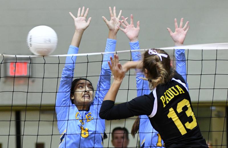 Cape’s Simran Patel, left, and Erin Morrissey block a kill attempt by Padua’s Mackenzie Sobczyk. DAN COOK PHOTOS