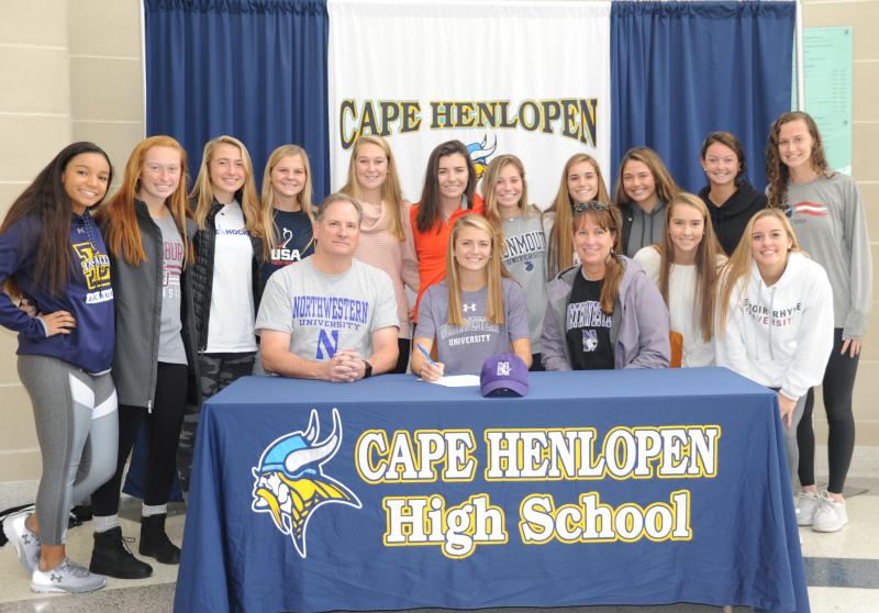 Alia Marshall is heading to Northwestern for field hockey. Shown in back are (l-r) Karissa Worley, Maci Long, Marlee Geppert, Paige Ludwicki, Lee Lee Wilson, Chloe Schaeffer, Cami Smith, Bella Conte, Taylor Smith, Lola Messick and Jackie Cannon. In front are her father Doug, Alia, her mom Mary, Anna Harrington and Jillian Seker. DAVE FREDERICK PHOTOS