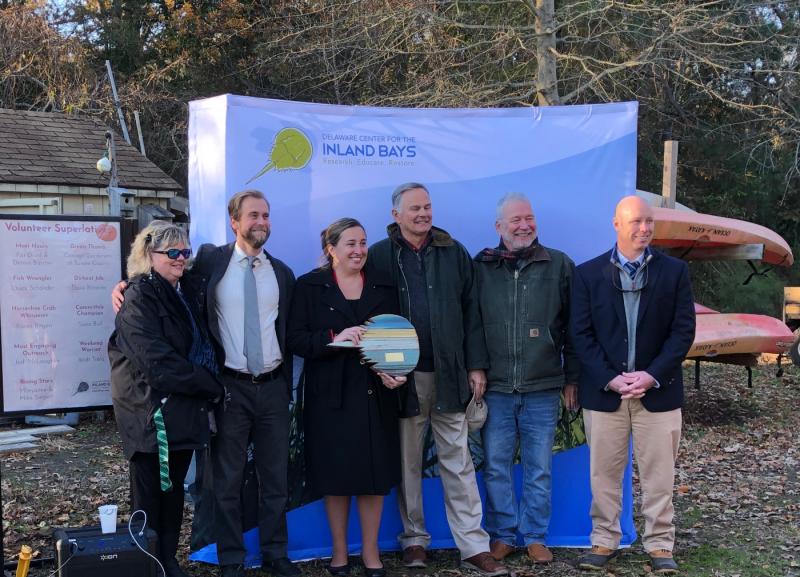 At the presentation are (l-r) Patti Deptula, former Sussex County engineering department employee, Center for the Inland Bays Director Chris Bason, County Finance Director Gina Jennings, County Council Vice President George Cole, County Councilman I.G. Burton and County Administrator Todd Lawson. SUBMITTED PHOTO