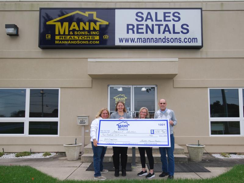 Mann & Sons donates to Immanuel Shelter Cape Gazette