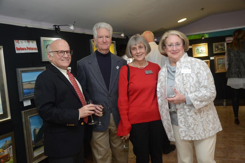 Socializing in the art room are (l-r) Jim Culley, Tim Brooks, trustee Martha Brooks and Chair of the Board of Trustees Mary Culley. Children’s Beach House Winter White