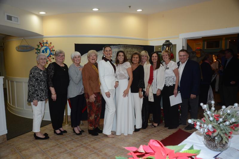 The Winter White Event Committee gathers for a photo. Shown are (l-r) Joy Kelly, Janet Hohnholt, Linda Fischer, Connie Miller, co-chairs Kim Hutchinson and Holly Scaro, Carol Hall, Mimi Stellini, Vicki Topel, CBH Vice President of Development Pat Tosi and CBH Executive Director Rich Garrett. Children’s Beach House Winter White