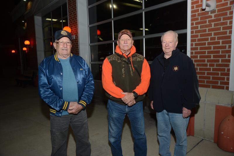 Meeting up at the Millsboro Fire Department, before the gift delivery, are (l-r) FOP Lodge #2 Vice President and retired Lewes Police officer Bob Doty, retired Delaware State Police officer and FOP Lodge #2 Secretary Steve Smyk, and retired U.S. Postal Inspector and FOP Treasurer Jerry Gibson. FOP Christmas