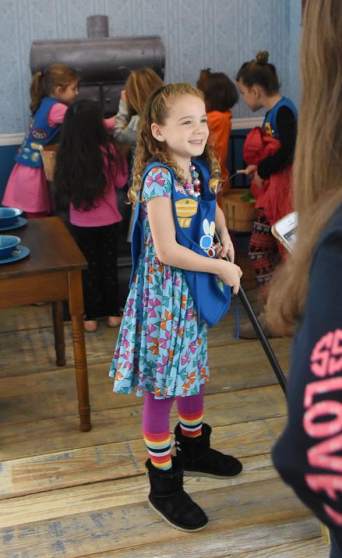 Daisy Troop member Addison Mohacey is all smiles after entering the new children’s area of the museum.