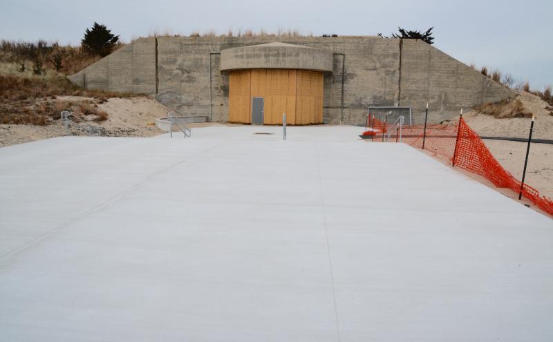 A large, concrete, events venue overlooking the ocean is a new addition to the Fort Miles Museum. The wood will be replaced by a glass window.