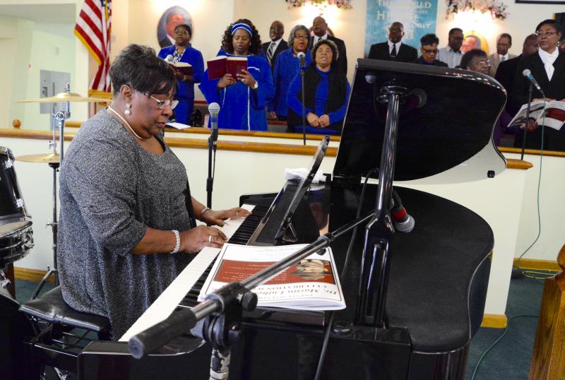 The Rev. Cythinia Daniels-Williams of Friendship Baptist Church in Lewes accompanies the C.N. Sample Gospel Choir from St. John 2nd Baptist Church.