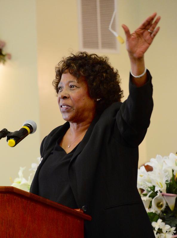 The Rev. Deborah McCaffity of St. George AME Church in Lewes feels the spirit as she delivers the invocation.