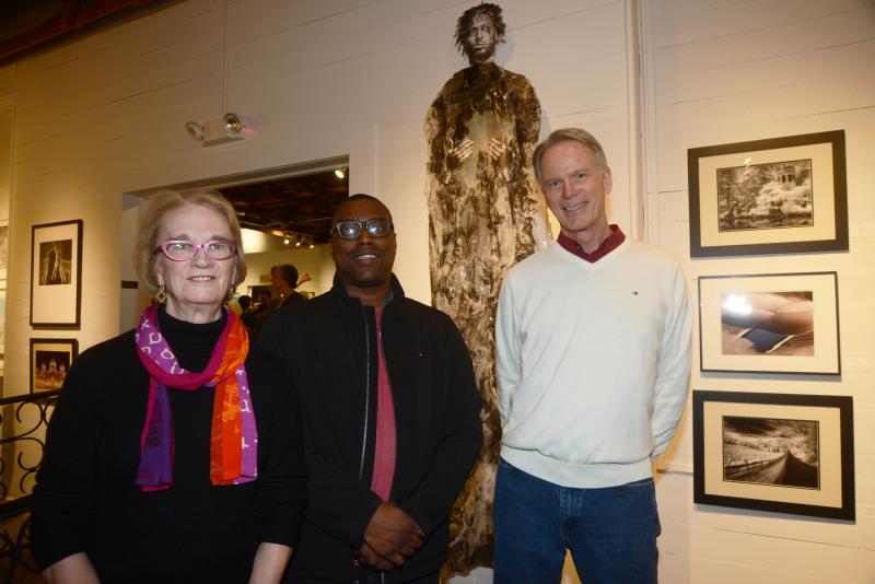 First place in the exhibition was awarded to Antonio McAfee, center, for his collage titled “D’Angelo as Mary Magdalene.” Shown with McAfee are Juror Alida Fish, left, and award sponsor Terry Plowman, publisher and editor of Delaware Beach Life. RAL Juried Photo exhibit
