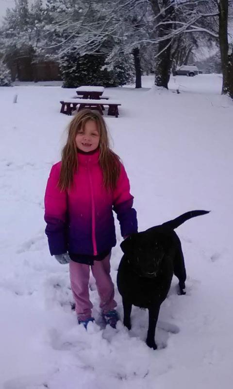 Samantha Gove, left, and Mollie Mooney had a good time romping in the snow.