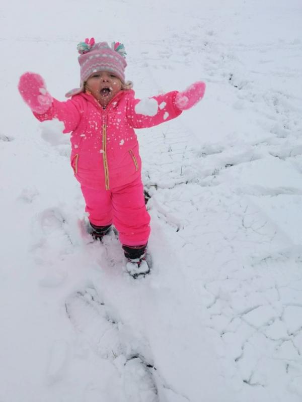 Casey Cashdollar sent in this photo of Lilo Hocker chasing her mom with a snowball.