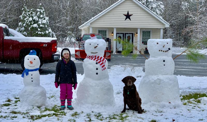 Allie and her furry brother Rusty enjoy the snow in Georgetown in this photo sent in by Hillary Graves.