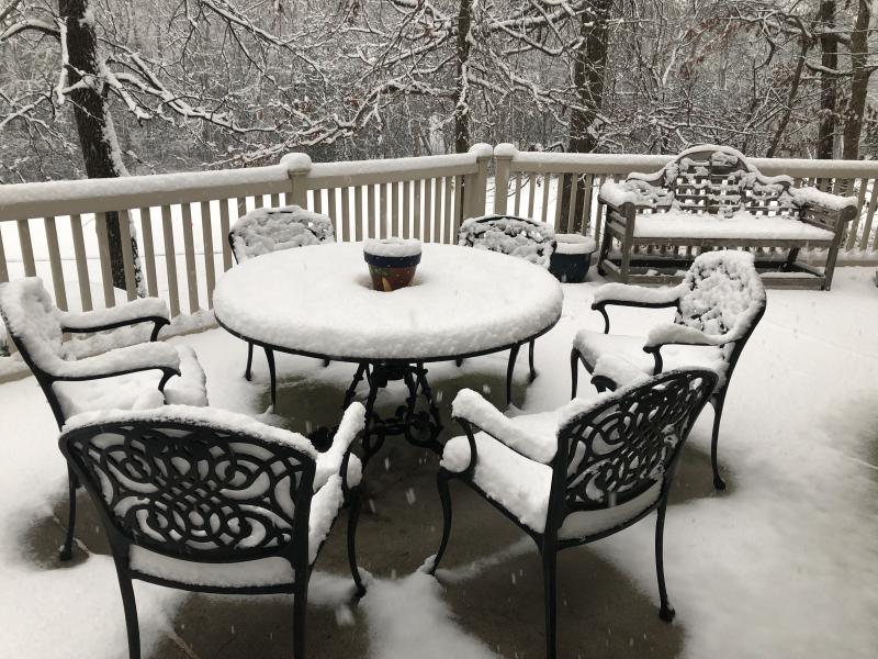 Gloria Merryman invites guests to join her on the deck for lunch. “The first snow is always beautiful and peaceful,” she said.