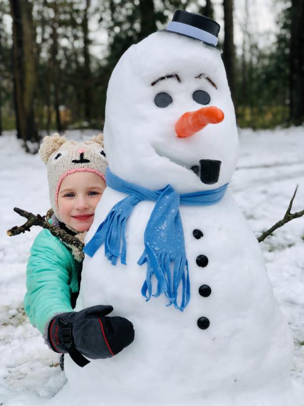 Sarah Wiggins of Lewes built a snowman with her big brothers in the backyard.