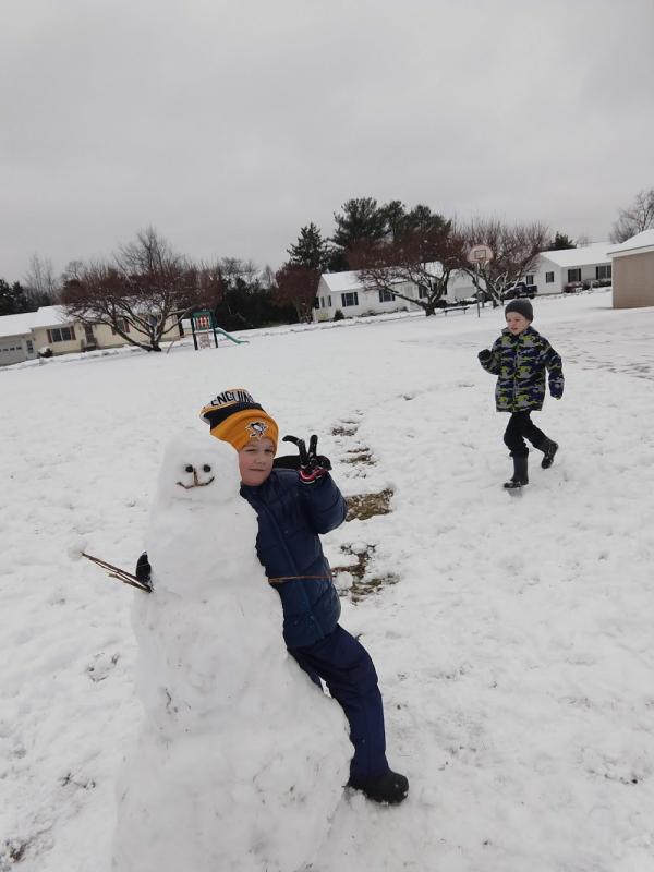 Zach and Ryan Day enjoy the snow in Rehoboth Beach.