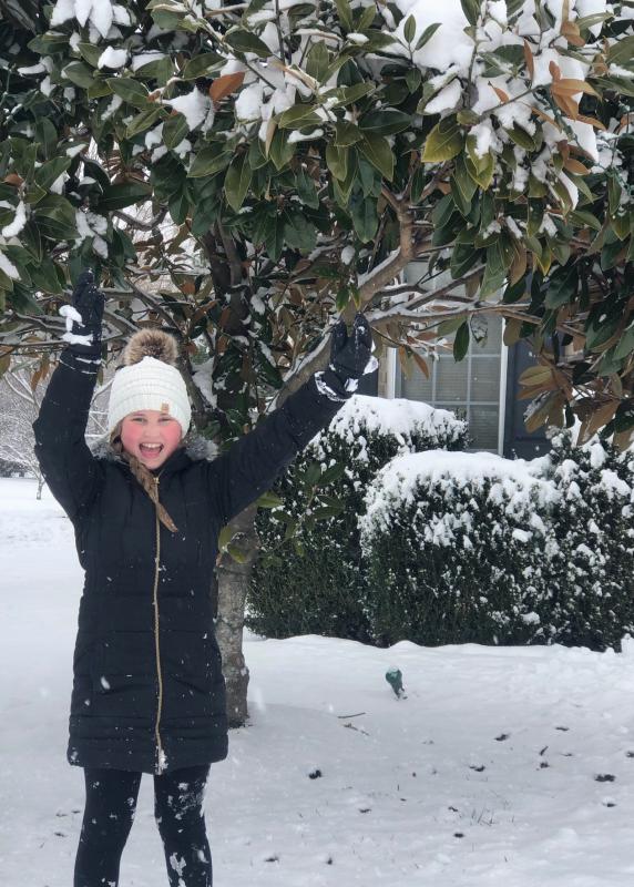Skylar Yost, 10, lives it up in the snow in this photo submitted by Monique Yost.