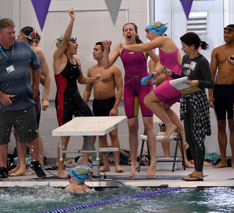 As freestyle leg swimmer Erin Morrissey touches up the Cape medley, relay teammates of Aya Daisey, Madelyn McGreevy and Gianna Vayda celebrate their win in 1:58.22.
