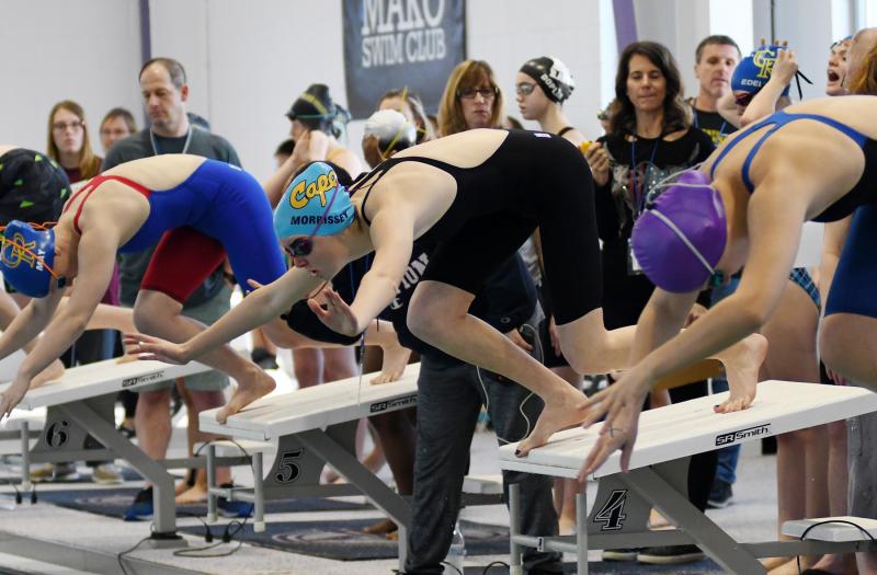 Cape’s Erin Morrissey leaves the blocks to start the winning 200 free relay. She and teammates Amaya Daisey, Madelyn McGreevy and Aya Daisey won with a time of 1:44.06.