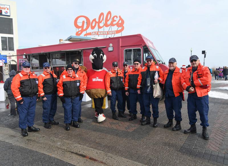Coast Guard Auxiliary members volunteering for the Plunge are Michael Geletej, John Craig, Deb Roberson, Fran Doyle, Wally the Wawa Goose, Jerry Roderick, Al Liszewski, Tom Roberson, Bob Lippman, Joe Kulesa and Lewis McCillough. DAN COOK PHOTO
