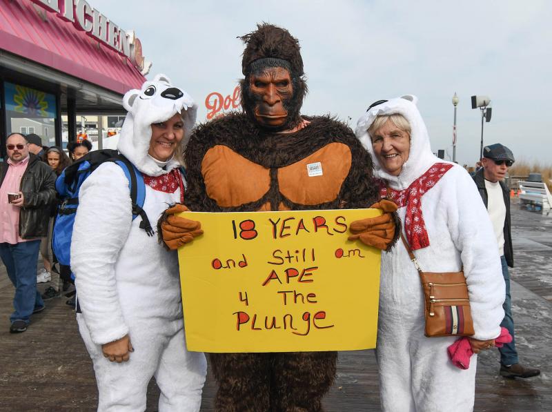 Jeremy Eglit, center, has taken the plunge for 18 years, along with his mother Jamie, left, and grandmother Marianne Smith. DAN COOK PHOTO