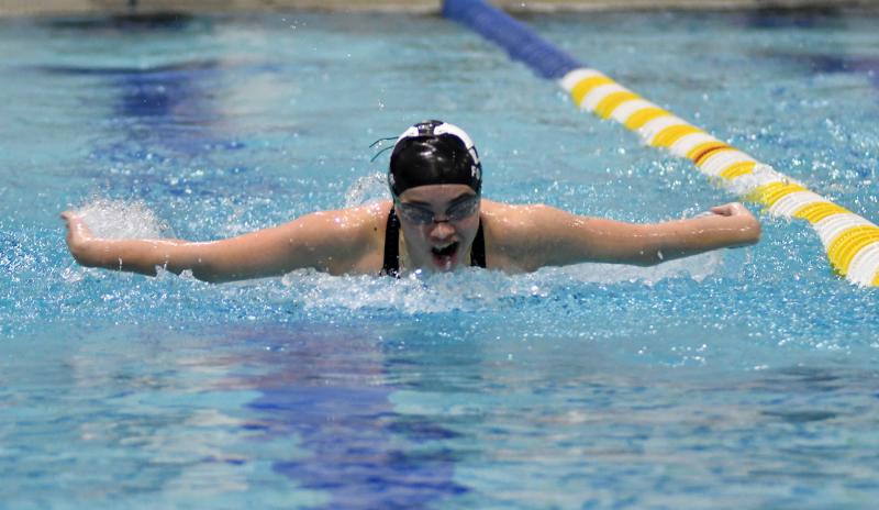 Molly Doppler swims the fly for Sussex Tech.