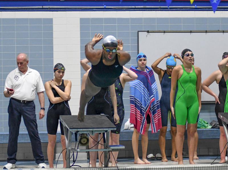 Sussex Tech’s Brittany Hall leaves the blocks in the 200 free relay.