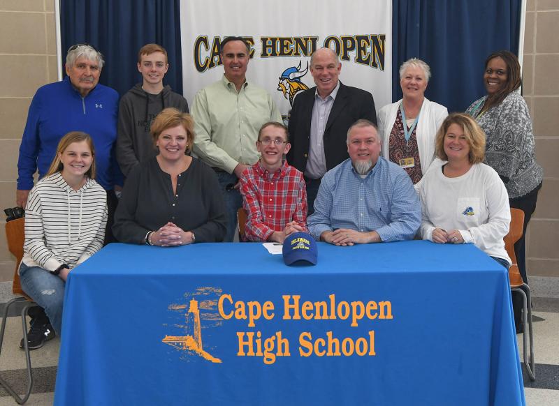 Members of friends and family taking part in Zach Simpler’s signing are in back (l-r) Dave Frederick, Wyatt Simpler, Sen. Ernie Lopez, Speaker of the House Pete Schwartzkopf, Margaret Haas and Robin Savage. In front are Paige Ludwicki, Jana Simpler, Zachary Simpler, Mike Simpler and Kim Simpler. DAN COOK PHOTOS