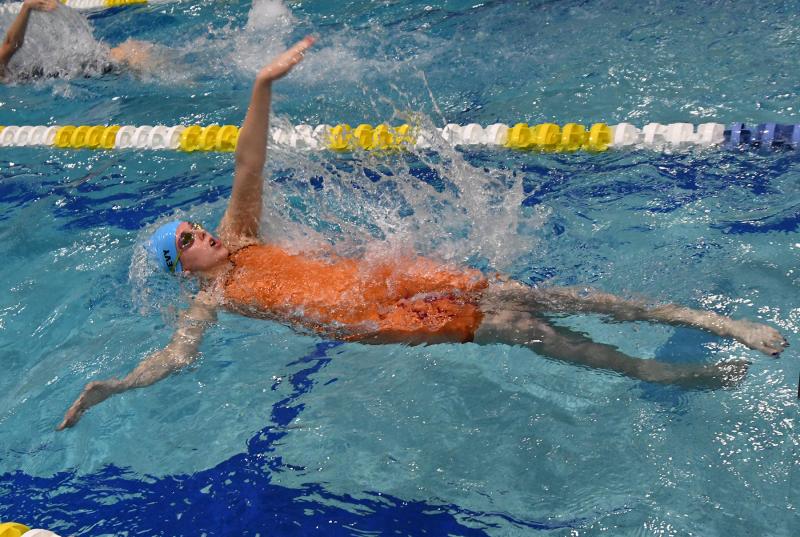 Cape senior Madelyn McGreevy swims the backstroke leg of the medley relay.