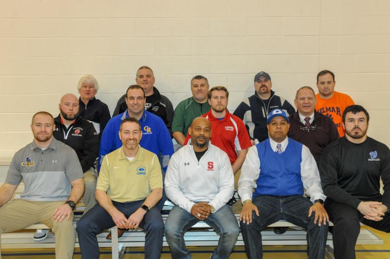 Henlopen Conference coaches include in back (l-r) Dave Rodgers, Seaford; Scott Layfield, Sussex Tech; Jeff Windish, Indian River; Mike Hansen, Lake Forest; and Alan Preston, Delmar. In middle are James Demko, Polytech; Dan Rigby, Caesar Rodney; Zach Toadvine, Laurel; and Don Parsley, Milford. In front are Shane Miller, Sussex Central; Chris Mattioni, Cape Henlopen; Aaron Harris, Smyrna; Alex Meade, Dover; and Shane Marvel, Woodbridge.
