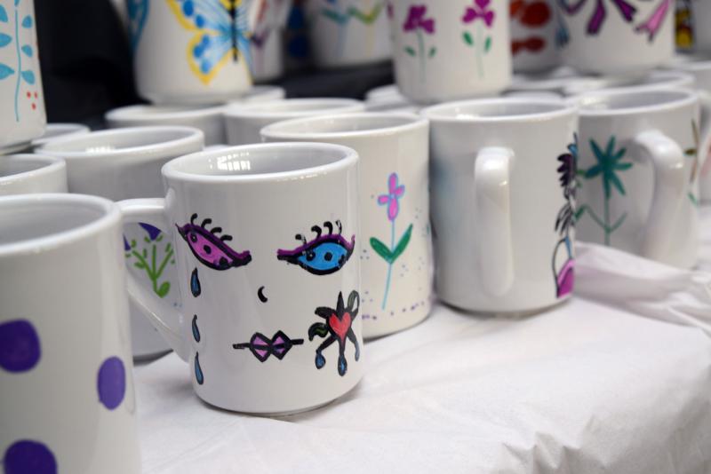 Hand-painted cups, decorated by artists in the Creative heARTs program, came with the entry fee to the event. Souper Bowl